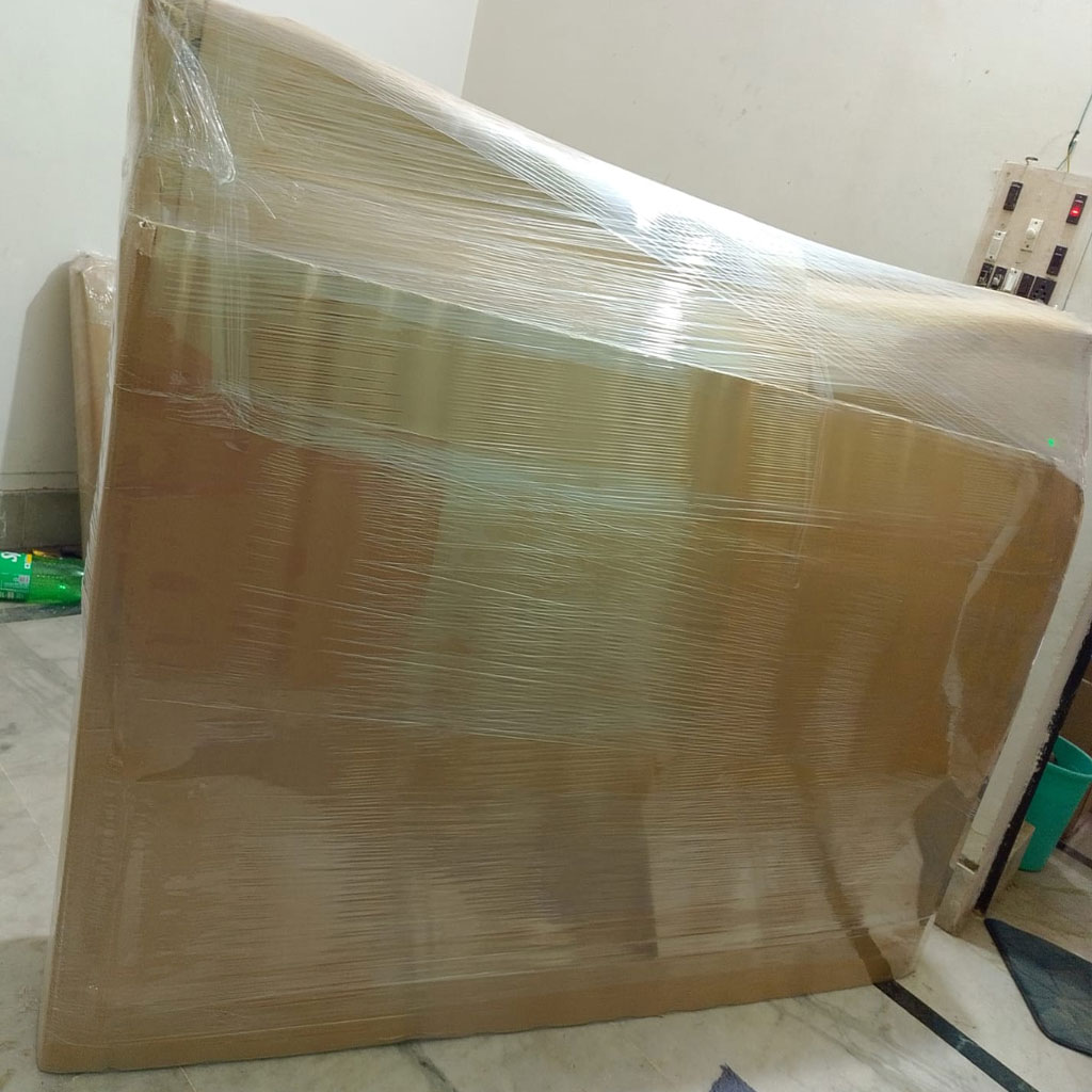 Fragile items being wrapped for shifting