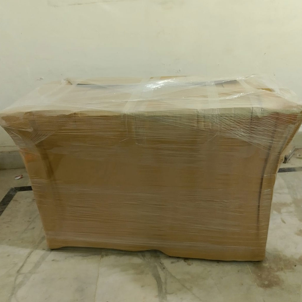 Movers carrying boxes to truck